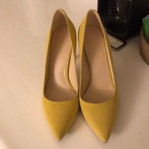 Yellow suede pumps